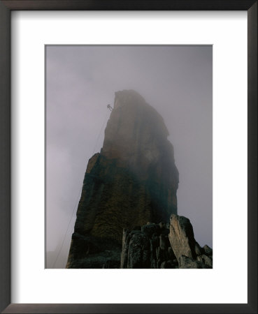 Climber Descending El Obelisco In Bolivia by Bobby Model Pricing Limited Edition Print image