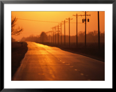 A Country Highway Fades Into The Sunset Near Wood River, Nebraska by Joel Sartore Pricing Limited Edition Print image