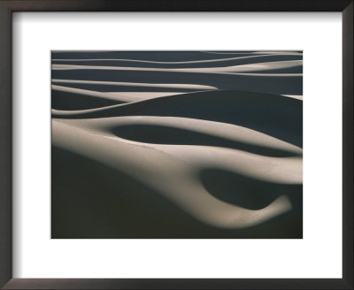The Light Casts A Luminous Glow Over The Sand Dunes Of The Sahara by Peter Carsten Pricing Limited Edition Print image