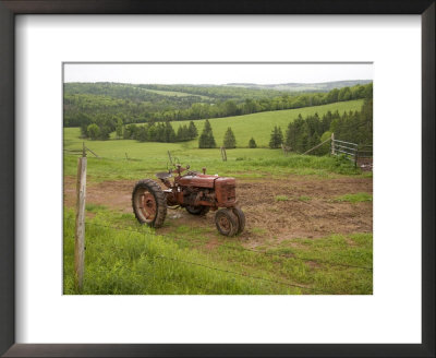 A Tractor Sits In A Farm Field On A Misty Rainy Morning In Springtime, Prince Edward Island, Canada by Taylor S. Kennedy Pricing Limited Edition Print image