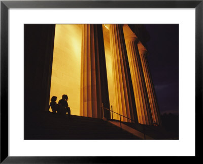Two Girls In Silhouette Sit On The Steps Of The Lincoln Memorial by Raul Touzon Pricing Limited Edition Print image