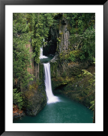 A Waterfall Flows Into A Pool In Oregon by Paul Nicklen Pricing Limited Edition Print image