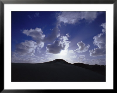 Sunlight Striking Fluffy Clouds Above Sand Dunes by Jason Edwards Pricing Limited Edition Print image