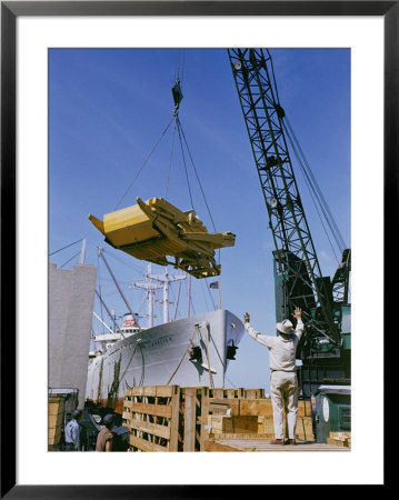A Ship Being Loaded With Farm Equipment by Justin Locke Pricing Limited Edition Print image