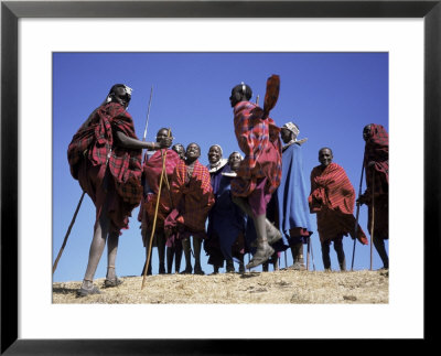 Masai Warriors Performing Jumping Dance, Serengeti Park, Tanzania, East Africa, Africa by D H Webster Pricing Limited Edition Print image