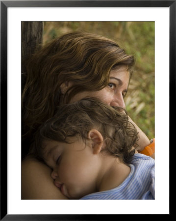 Woman With Her Sleeping Child At Anahola Beach, Hawaii by Bill Hatcher Pricing Limited Edition Print image