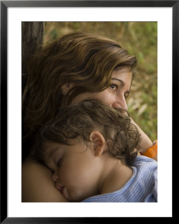 Woman With Her Sleeping Child At Anahola Beach, Hawaii by Bill Hatcher Pricing Limited Edition Print image