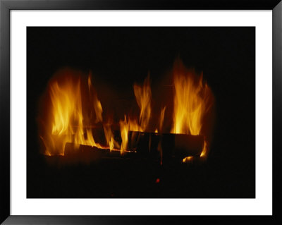 A Log Fire In A Fireplace by Todd Gipstein Pricing Limited Edition Print image