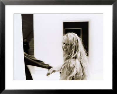 A Model Smiles At The Camera by Sisse Brimberg Pricing Limited Edition Print image