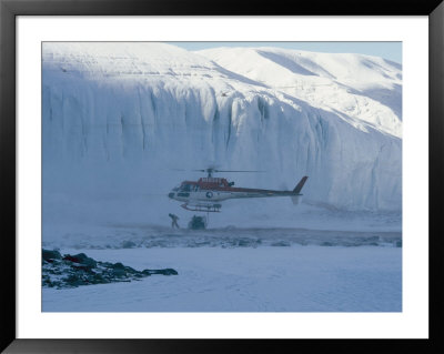 A Helicopter Delivers Supplies To Scientists Working In Antarctica by Maria Stenzel Pricing Limited Edition Print image