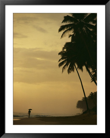 Person Walking Along A Beach In Sri Lanka by Steve Winter Pricing Limited Edition Print image