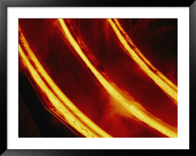 Molten Steel Flows Through A Steel Mill by Paul Chesley Pricing Limited Edition Print image