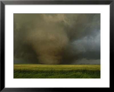 An F4 Category Tornado Travels Across A Field At Great Speed by Peter Carsten Pricing Limited Edition Print image