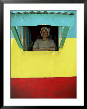 Woman In Window Of Rasta Coloured Shop, Sheshamane, Ethiopia, Africa by Dominic Harcourt-Webster Pricing Limited Edition Print image