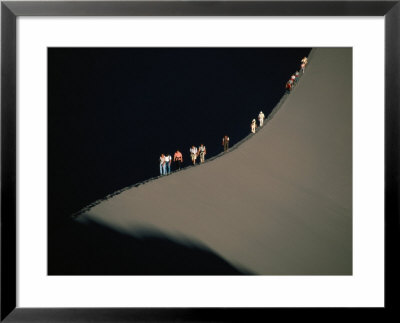 Tourists Forming A Train Across Dunes In The Valley Of The Moon, Valle De La Luna, Chile by Aaron Mccoy Pricing Limited Edition Print image
