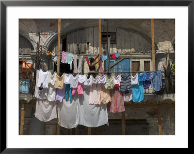 Large Quantity Of Laundry Hanging From The Balcony Of A Crumbling Building, Habana Vieja, Cuba by Eitan Simanor Pricing Limited Edition Print image