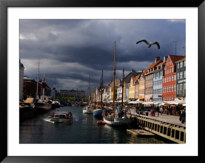 Tourist Boat Cruises Nyhavn, New Harbor, Along The Scenic Canal In Copenhagen by Keenpress Pricing Limited Edition Print image