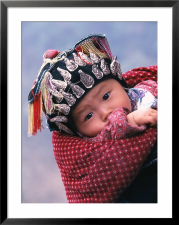 Miao Baby Wearing Traditional Hat, China by Keren Su Pricing Limited Edition Print image