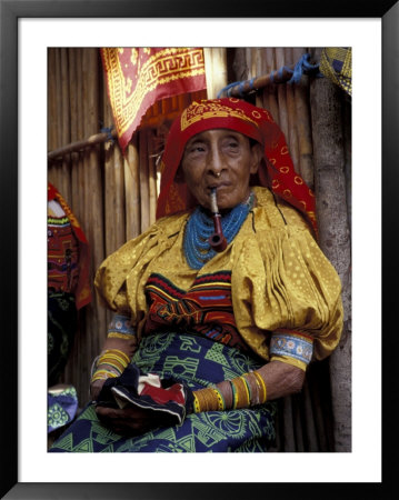 Old Woman With Pipe In Hand-Stitched Molas, Kuna Indian, San Blas Islands, Panama by Cindy Miller Hopkins Pricing Limited Edition Print image