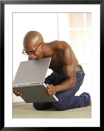 African-American Man Biting Laptop On The Floor by Jim Mcguire Pricing Limited Edition Print image