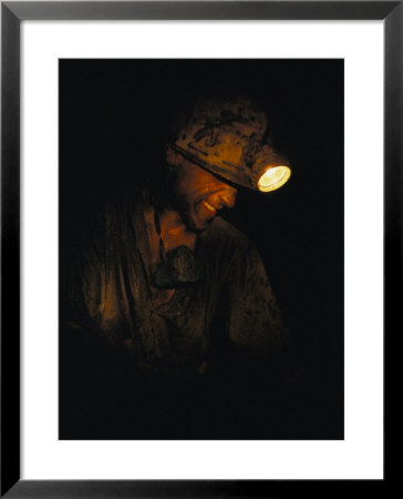 A Miner With A Head Lamp Works Inside The Csa Coal Mine At Karvina by James P. Blair Pricing Limited Edition Print image