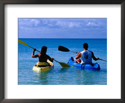 Man And Woman Kayaking On Fernandez Bay, Cat Island, Bahamas by Greg Johnston Pricing Limited Edition Print image
