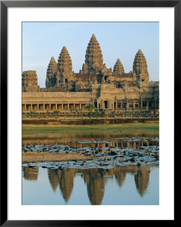 The Stone Causeway Leading To The Angkor Wat Temple In Evening Light, At Siem Reap, Cambodia, Asia by Gavin Hellier Pricing Limited Edition Print image