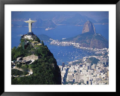 Statue Of Christ The Redeemer Overlooking City And Sugar Loaf Mountain, South America by Marco Simoni Pricing Limited Edition Print image