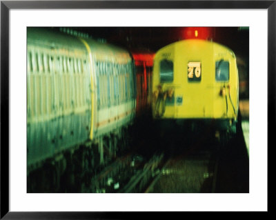Train Arriving At Underground Station, London, England by Jon Davison Pricing Limited Edition Print image
