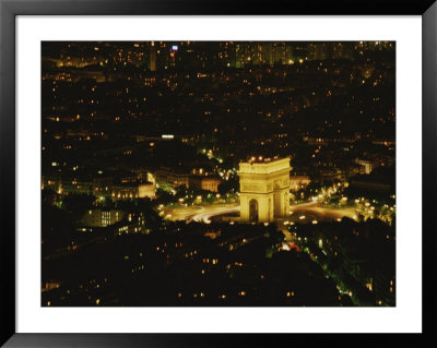 An Elevated View Of The Arc De Triomphe Illuminated At Night by Sam Kittner Pricing Limited Edition Print image