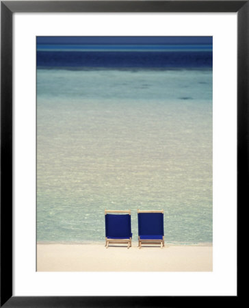 Beach Chairs On White Sand Beach Of Ari Atoll, Maldives by Stuart Westmoreland Pricing Limited Edition Print image
