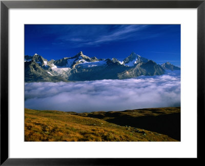 The Weisshornacross Cloud, Valais, Switzerland by Gareth Mccormack Pricing Limited Edition Print image