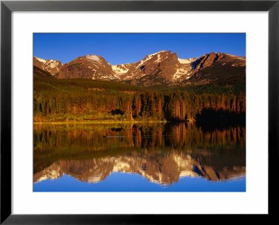 Sprague Lake Provides A Near-Perfect Mirror For The Surrounding Mountains, Colorado, Usa by Gareth Mccormack Pricing Limited Edition Print image