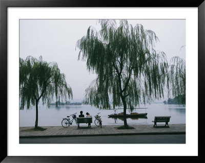 Bicyclists Enjoy The View In A Hangzhou Lakeside Park by James L. Stanfield Pricing Limited Edition Print image