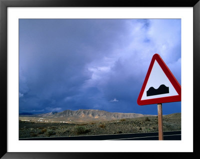 Road Sign Indicating Hilly Terrain, Isla De Fuerteventura, Canary Islands, Spain by Martin Lladó Pricing Limited Edition Print image
