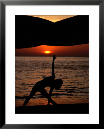 Woman Doing Yoga At Sunset, Phuket, Thailand, United States Of America by Jerry Alexander Pricing Limited Edition Print image
