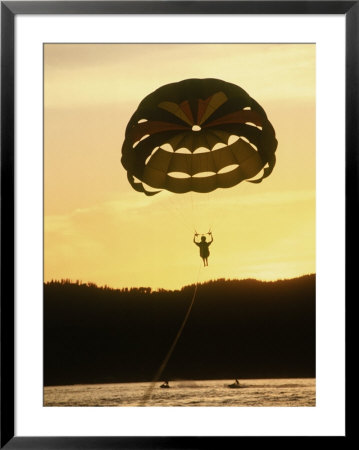 Bright Orange Sunlight With A Parachuter In The Sky by David Burch Pricing Limited Edition Print image