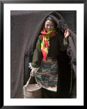 Tibetan Woman Carrying A Bucket To The Tent, East Himalayas, Tibet, China by Keren Su Pricing Limited Edition Print image