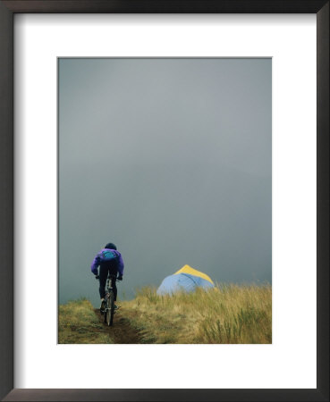 A Woman Rides Her Bicycle Towards A Tent In The Background by Dugald Bremner Pricing Limited Edition Print image