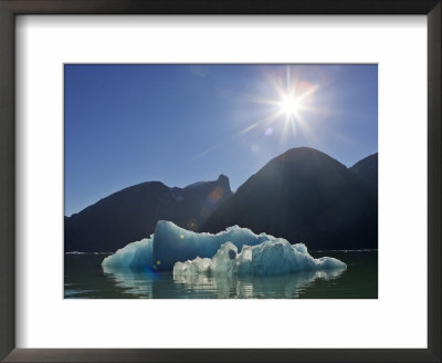 Sunburst And Blue Iceberg With Mountains On The Skyline, Alaska by Ralph Lee Hopkins Pricing Limited Edition Print image