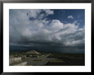 Storm Clouds Gather Over Teotihuacan by Kenneth Garrett Pricing Limited Edition Print image