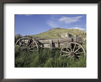 Old Wood Wagon Near Mining Ghost Town At Bannack State Park, Montana, Usa by John & Lisa Merrill Pricing Limited Edition Print image