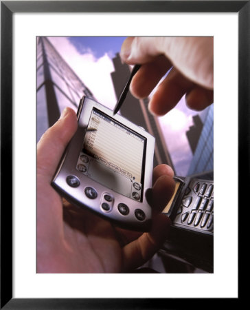 Hand Holding Palm Pilot M500 With Cell Phone by Eric Kamp Pricing Limited Edition Print image