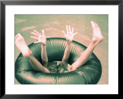 Legs And Feet Of A Child In Pool's Tube by Maria Taglienti Pricing Limited Edition Print image