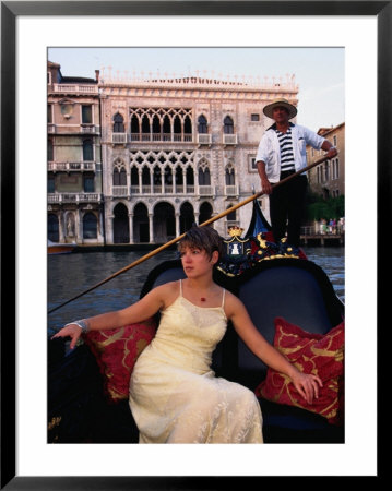 Woman In Gondola In Front Of Ca'd'oro In Grand Canal, Venice, Veneto, Italy by Roberto Gerometta Pricing Limited Edition Print image