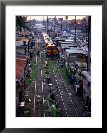 Squatter Houses Erected Close To Railway Line, Manila, Manila, Philippines by John Pennock Pricing Limited Edition Print image