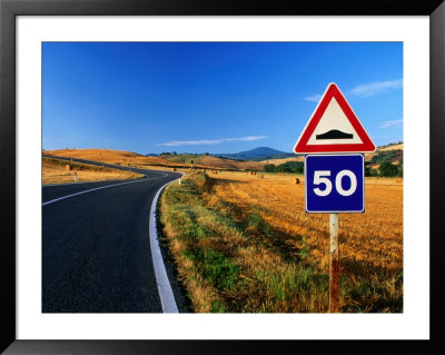 Speed Sign On Winding Road Near San Quirico D'orica, Tuscany, Italy by David Tomlinson Pricing Limited Edition Print image