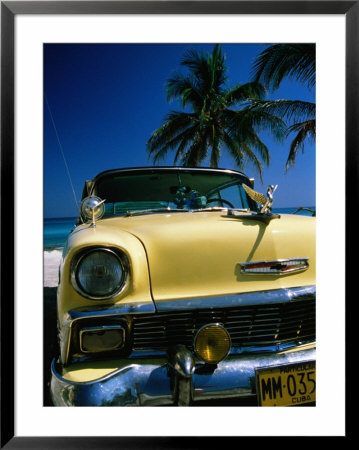 Old Yellow Chevrolet, Parked By The Ocean, Varadero, Matanzas, Cuba by Martin Lladó Pricing Limited Edition Print image