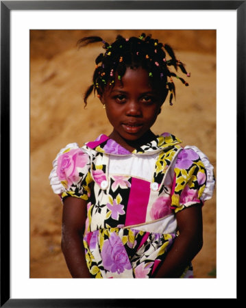 Portrait Of Young Girl, Looking At Camera, Sassandra, Cote D'ivoire by Pershouse Craig Pricing Limited Edition Print image