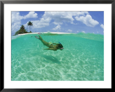 A Woman Snorkels In The Clear Blue Sea by Barry Tessman Pricing Limited Edition Print image
